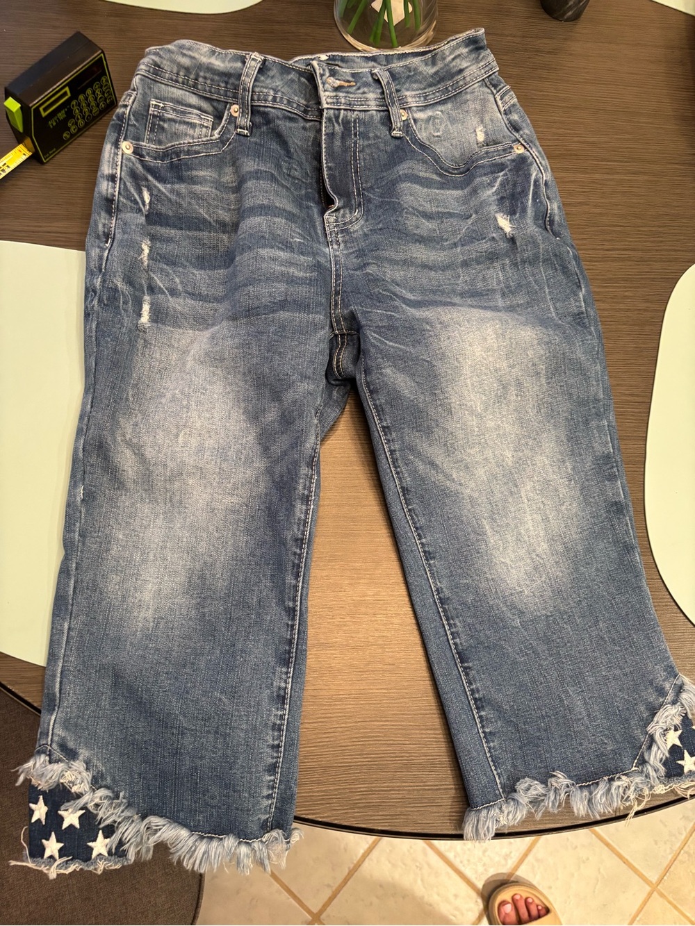 Women’s Distressed Blue Crop Jeans with Frayed Star Hem